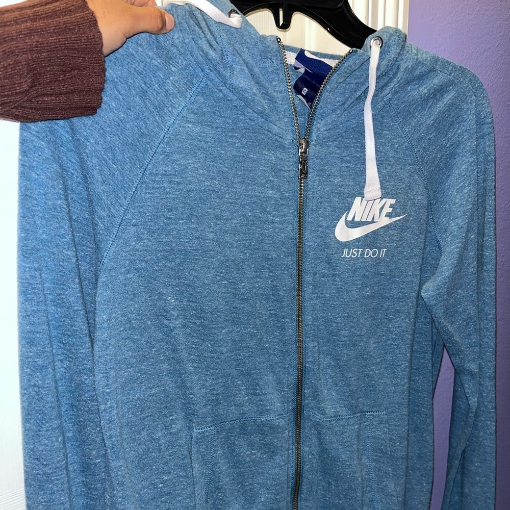 Nike light running sweater.